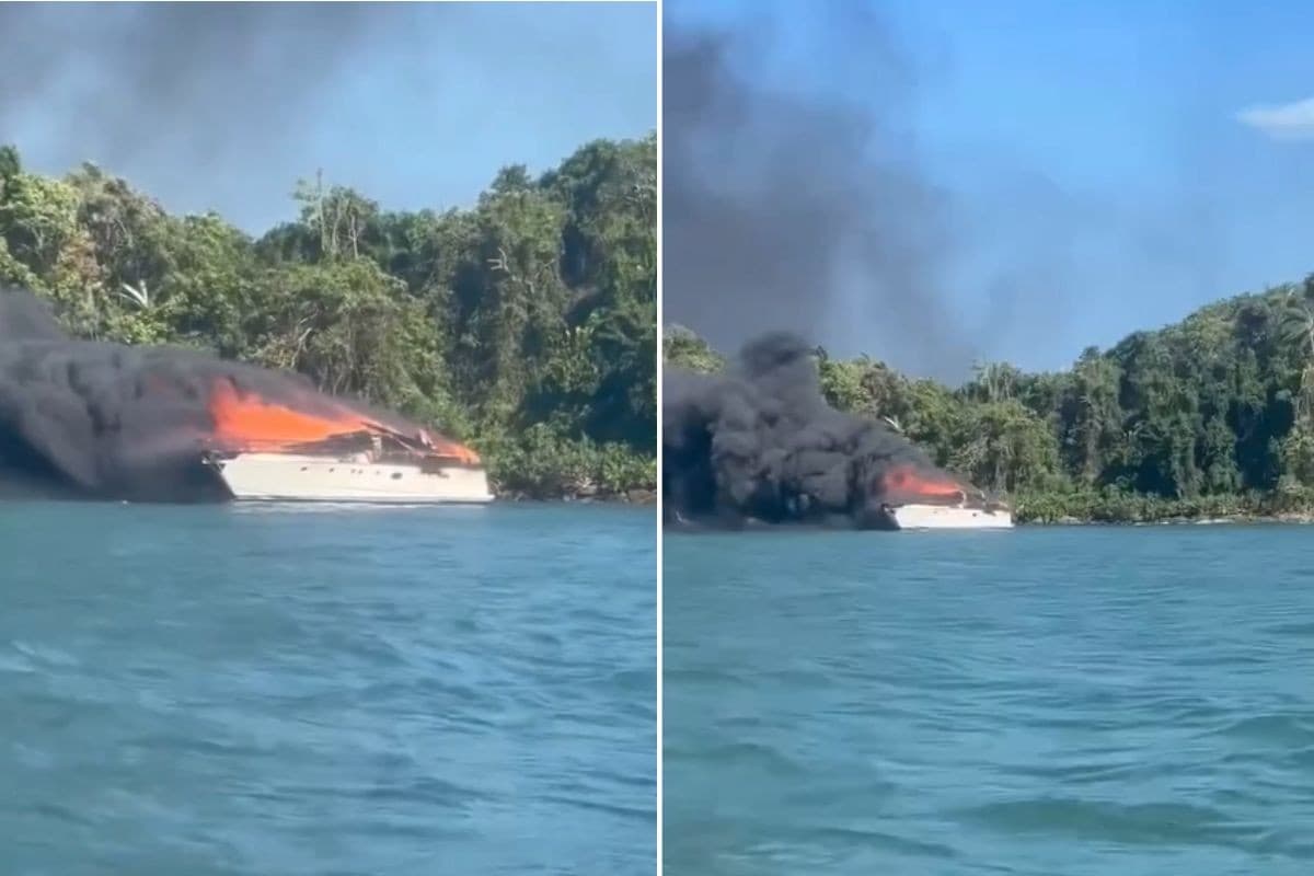 Lancha com 18 pessoas pega fogo a 200 metros de praia no litoral de SP; VÍDEO